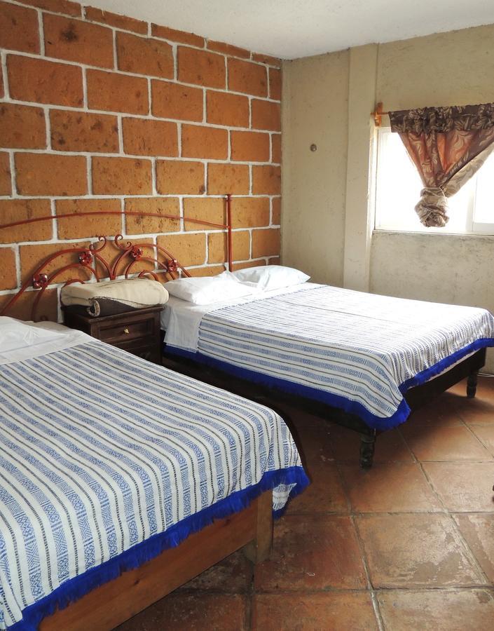 Hotel Las Fumarolas De Don Goyo Чолула Екстериор снимка