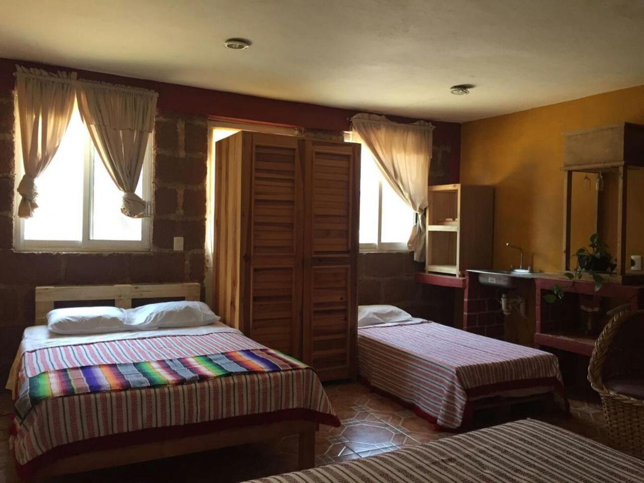 Hotel Las Fumarolas De Don Goyo Чолула Екстериор снимка
